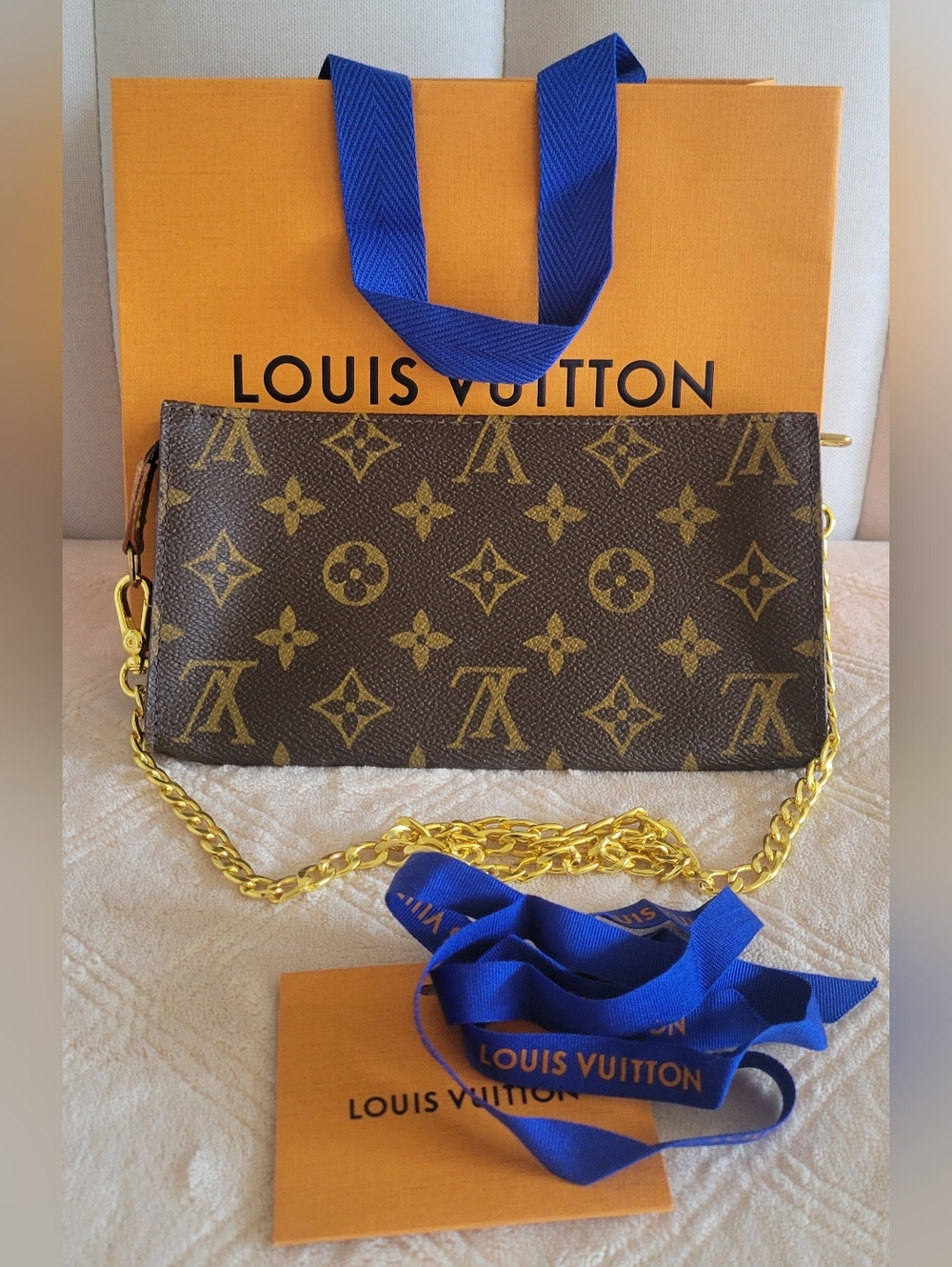 Authentic Louis Vuitton Brown Monogram Pouch,serial number:AR0997